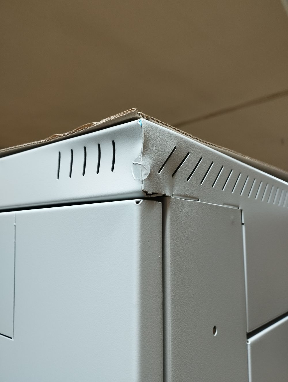 Triton 19"Schrank 42HE, B600/T1000, Lichtgrau, bis 800Kg, *Demoschrank hinten/links obere Ecke leicht Beschädigt*